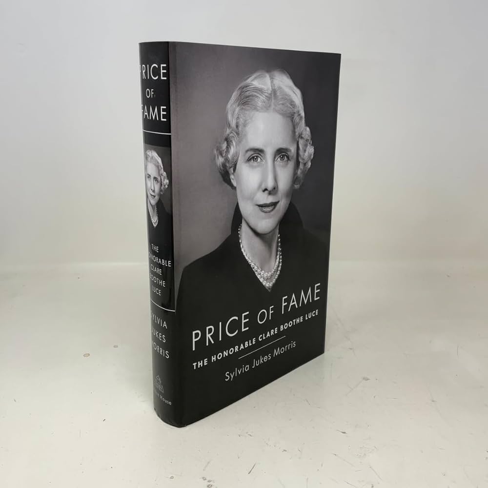 Autobiografia z czarno-białym portretem autora i kalendarzem w tle na stole